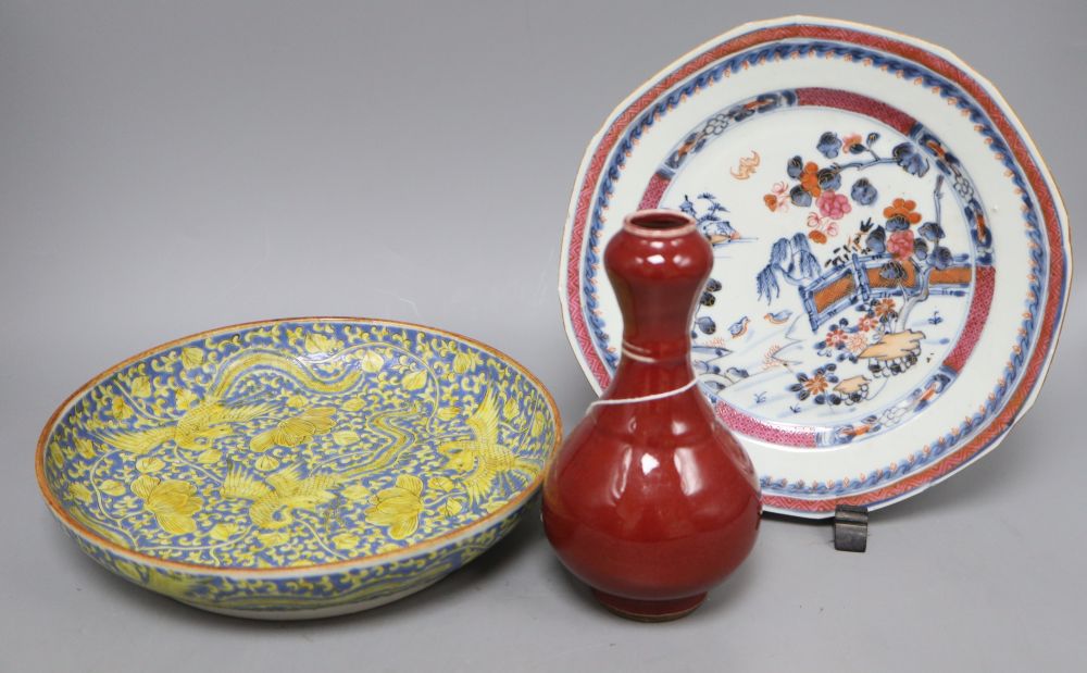 A Chinese sang-de-boeuf vase, a famille rose plate and a phoenix dish, vase H.17cm